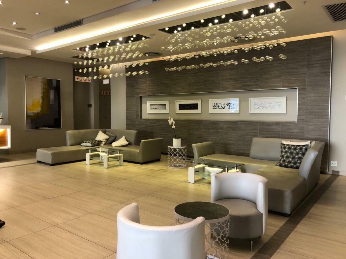 Sandton Skye Suites Йоханнесбург Экстерьер фото